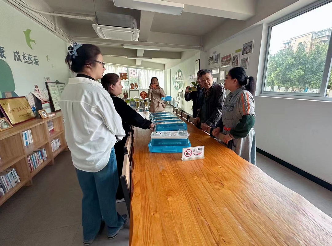 江北区工程师协会深入社区走访调研